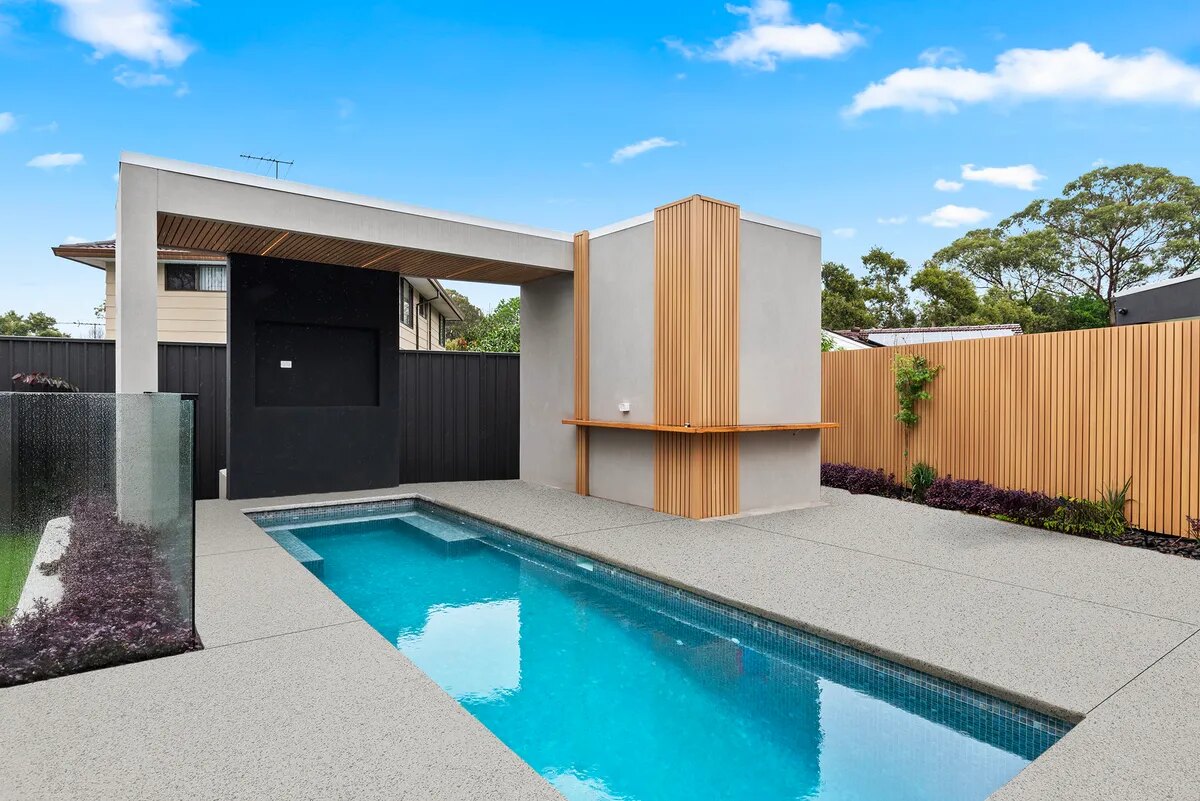Contemporary pool and timber screen constructed by NS Landscapes